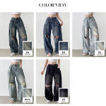 Женские баллон-джинсы с прорезями, защипами по бокам и объёмным широким кроем