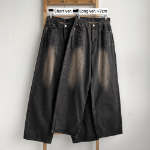 Женские джинсы с завышенной талией, винтажной варкой и объёмным полу-баллонным кроем