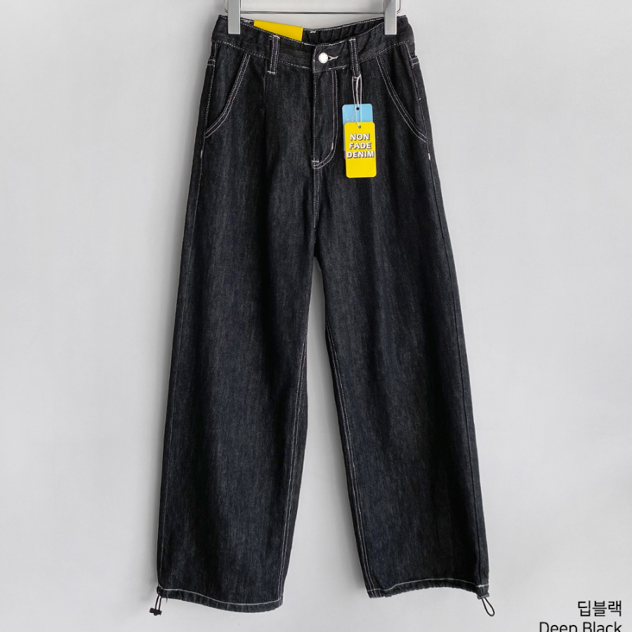 Женские джинсы из необработанного денима с защипом и шнурком на талии