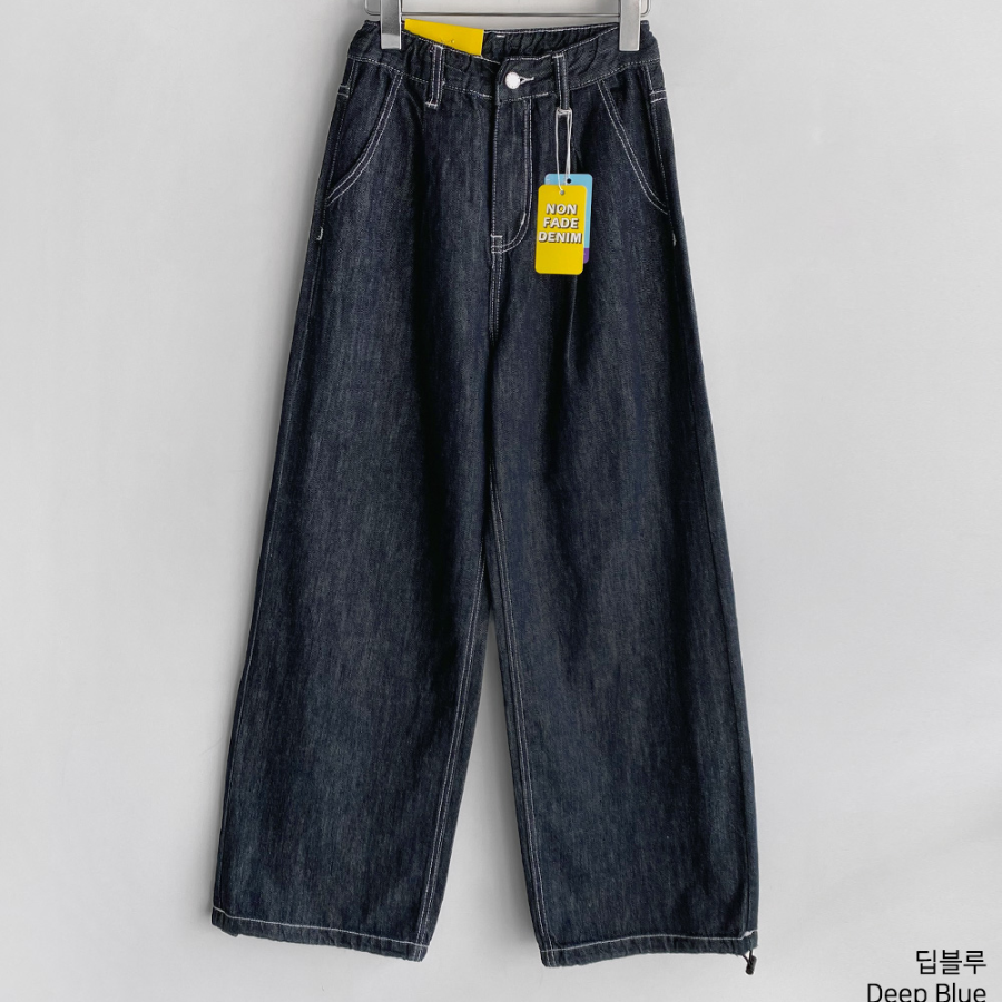 Женские джинсы из необработанного денима с защипом и шнурком на талии