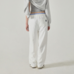 WHO.A.U — брюки Campus Emblem Wide Pants