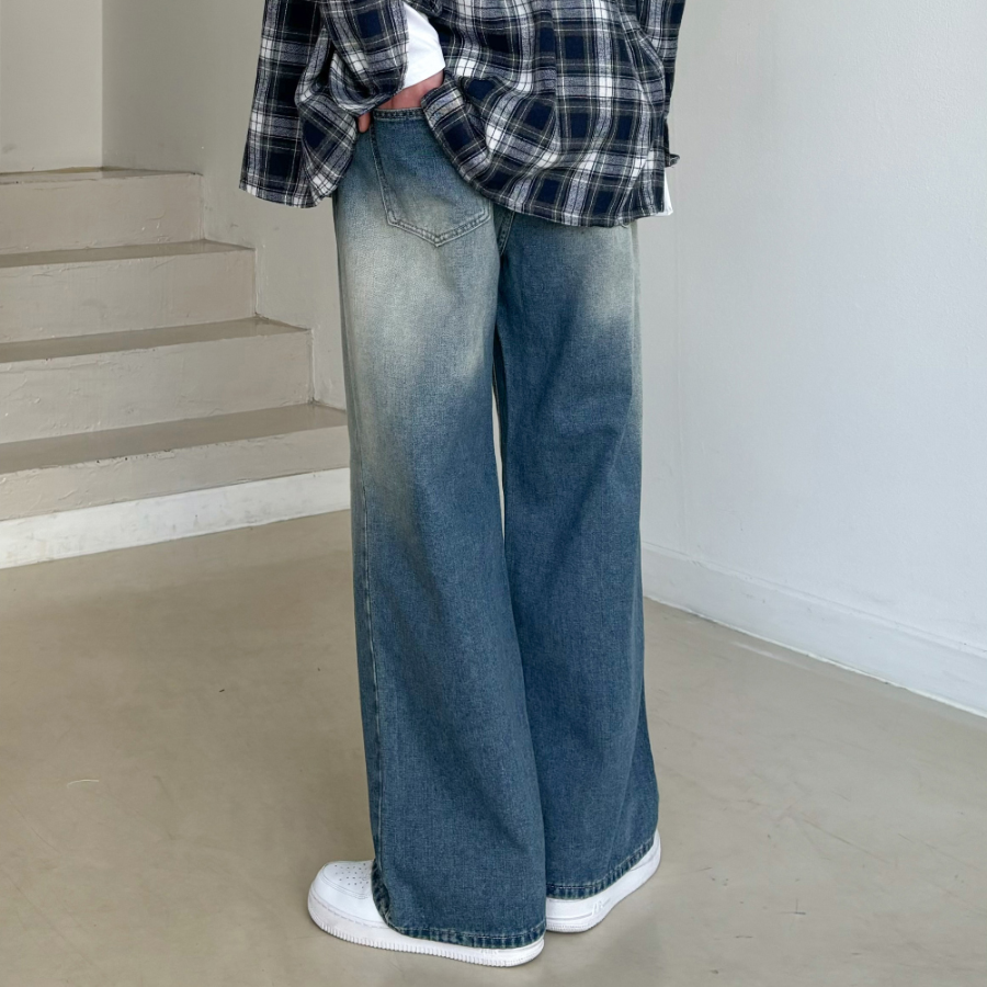 Унисекс джинсы с пескоструйной обработкой, резинкой на поясе и широкими штанинами