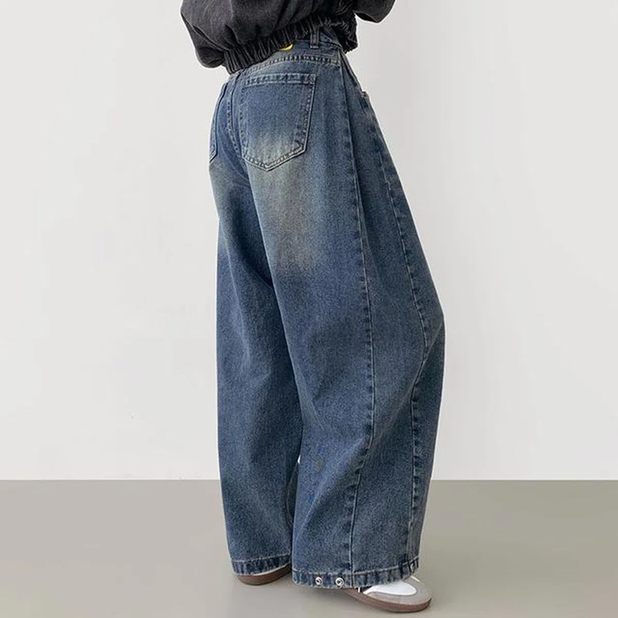 Женские balloon-джинсы с варкой, кнопками на штанинах и объёмным кроем