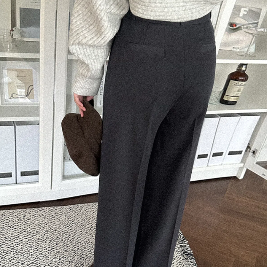 Женские широкие брюки с высокой посадкой и асимметричной застёжкой