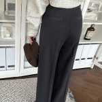 Женские широкие брюки с высокой посадкой и асимметричной застёжкой