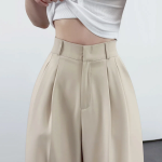 Женские широкие брюки с двумя защипами, потайной застёжкой и эластичной спинкой пояса