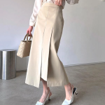 Асимметричная длинная юбка с высокой талией, защипами и разрезом