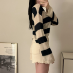 Ультракороткие джинсовые шорты с потертостями и необработанным краем