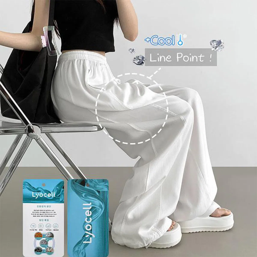 Свободные брюки из тенсела с эластичным поясом и разрезами