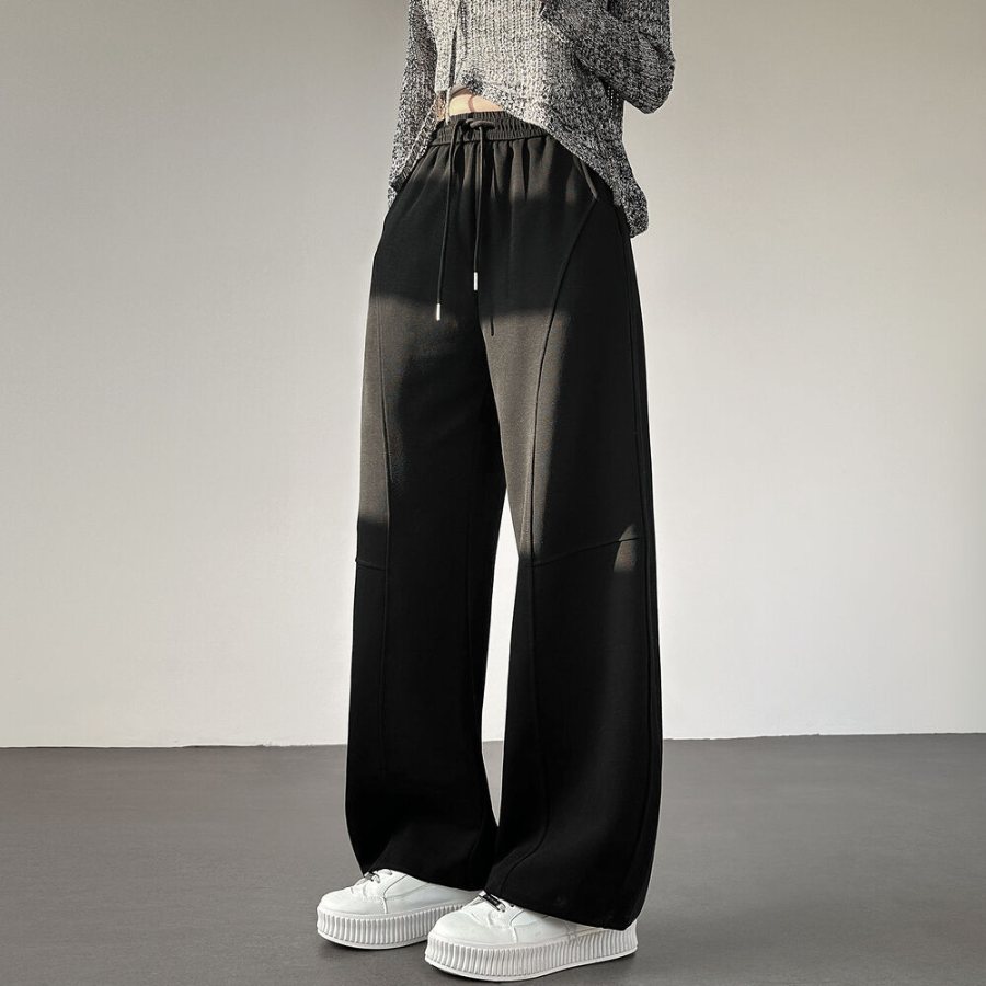 Длинные широкие трикотажные брюки с высокой посадкой и фигурными швами