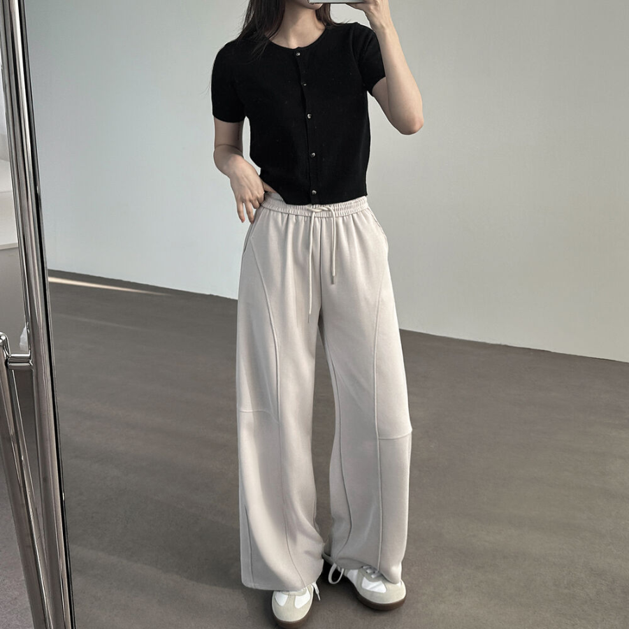 Длинные широкие трикотажные брюки с высокой посадкой и фигурными швами