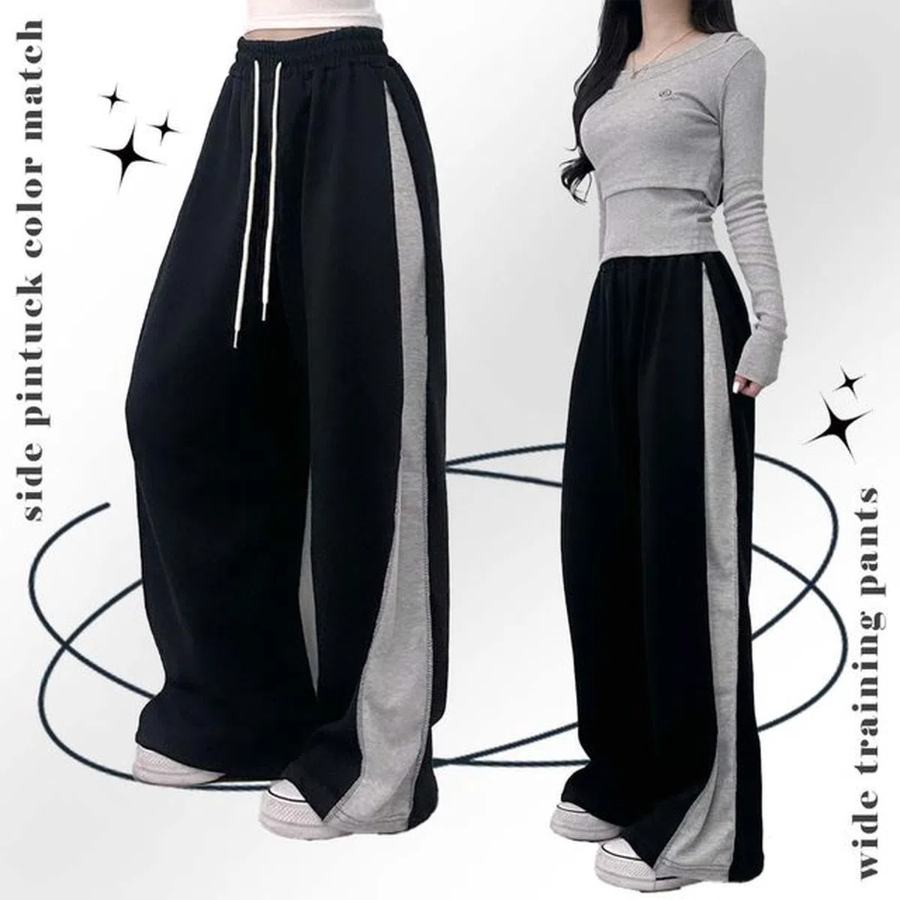 Удлинённые трикотажные брюки с защипами и эластичным поясом