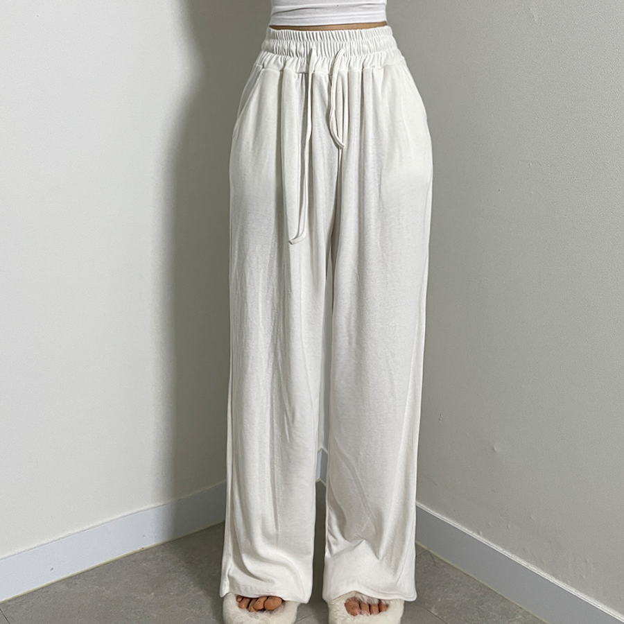 Широкие спортивные брюки из лёгкой ткани с высокой посадкой и плиссировкой