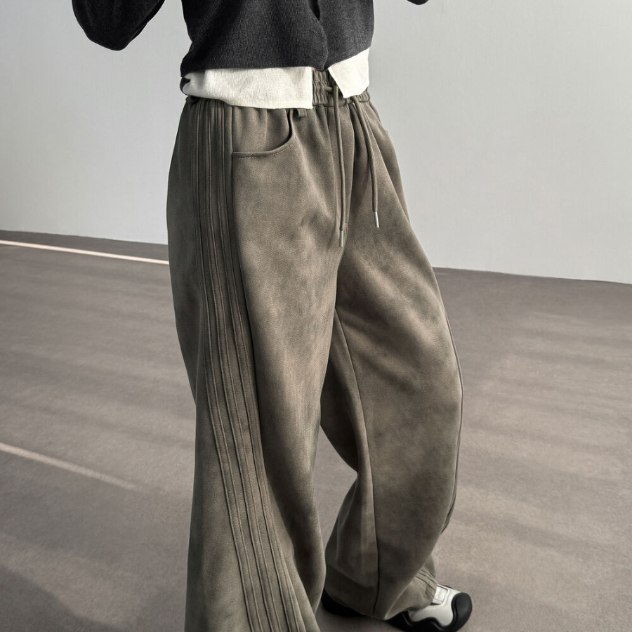 Широкие спортивные брюки с косыми полосками, эффектом стирки и шнурком на талии