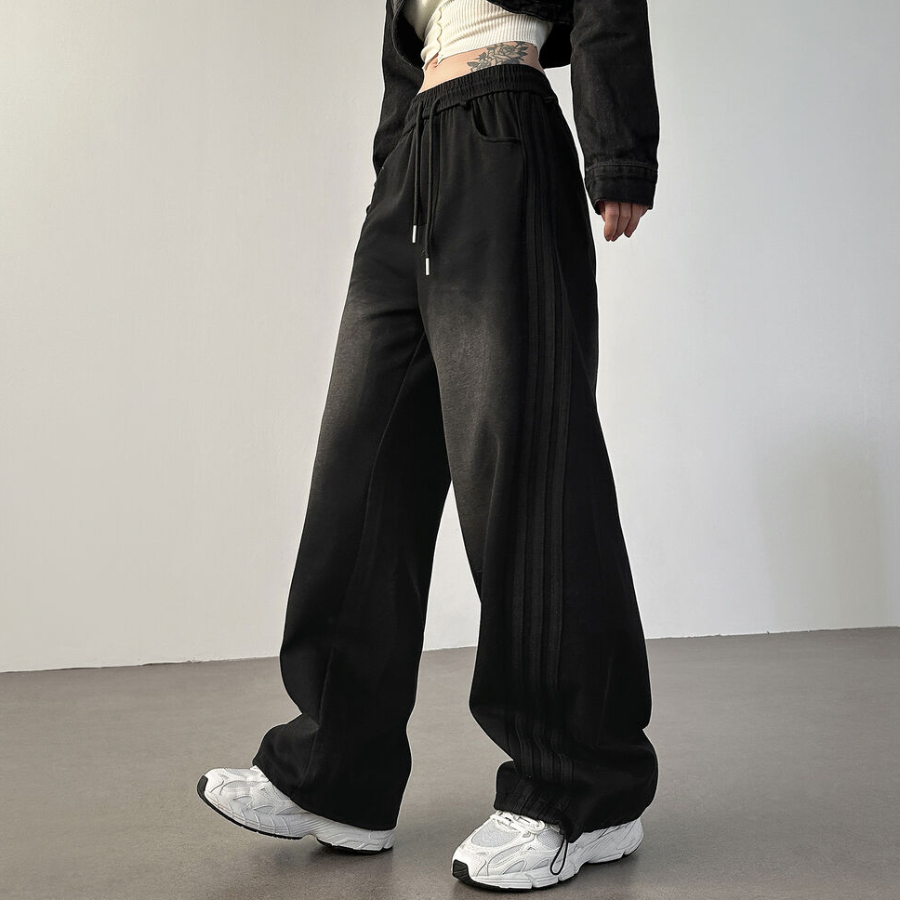 Широкие спортивные брюки с косыми полосками, эффектом стирки и шнурком на талии