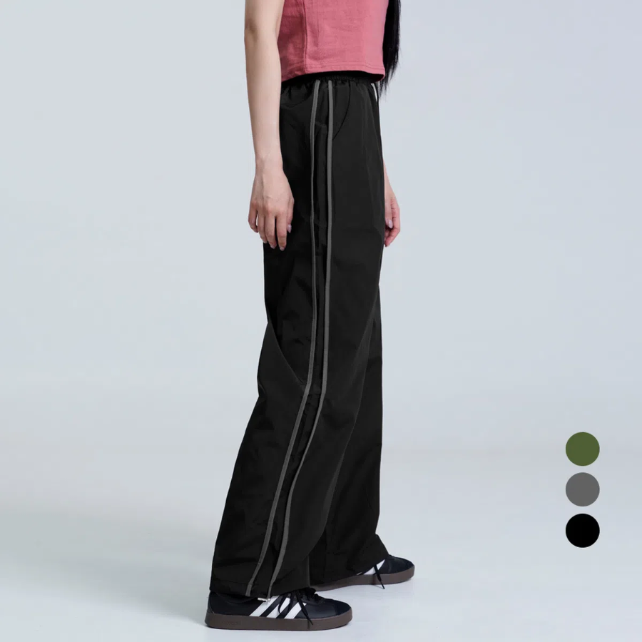 Тренировочные брюки из прочного нейлона с боковыми полосками и двухсторонним эффектом