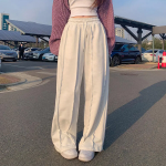 Высокие трикотажные брюки с эффектом "больше бёдер" и эластичным поясом