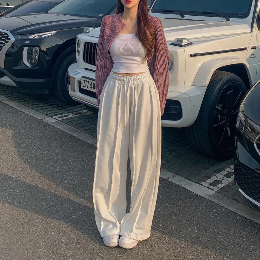 Высокие трикотажные брюки с эффектом "больше бёдер" и эластичным поясом