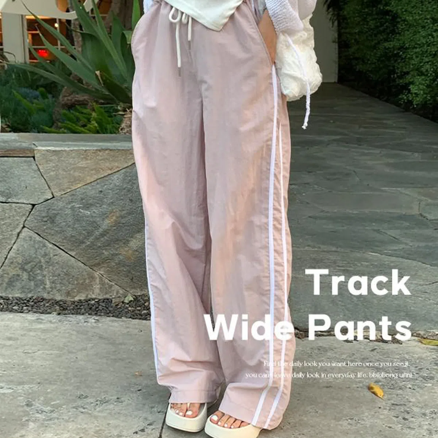 Спортивные тренировочные брюки с контрастными боковыми вставками и эластичным поясом