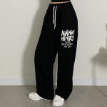Удлинённые широкие тренировочные брюки в стритстайле с английским принтом