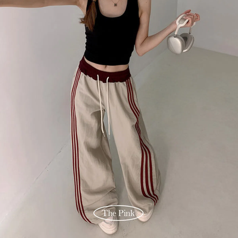 Широкие тренировочные брюки Naji с контрастной полосой и высокой посадкой