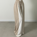 Широкие трикотажные брюки с контрастными вставками и защипами