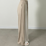 Широкие трикотажные брюки с контрастными вставками и защипами