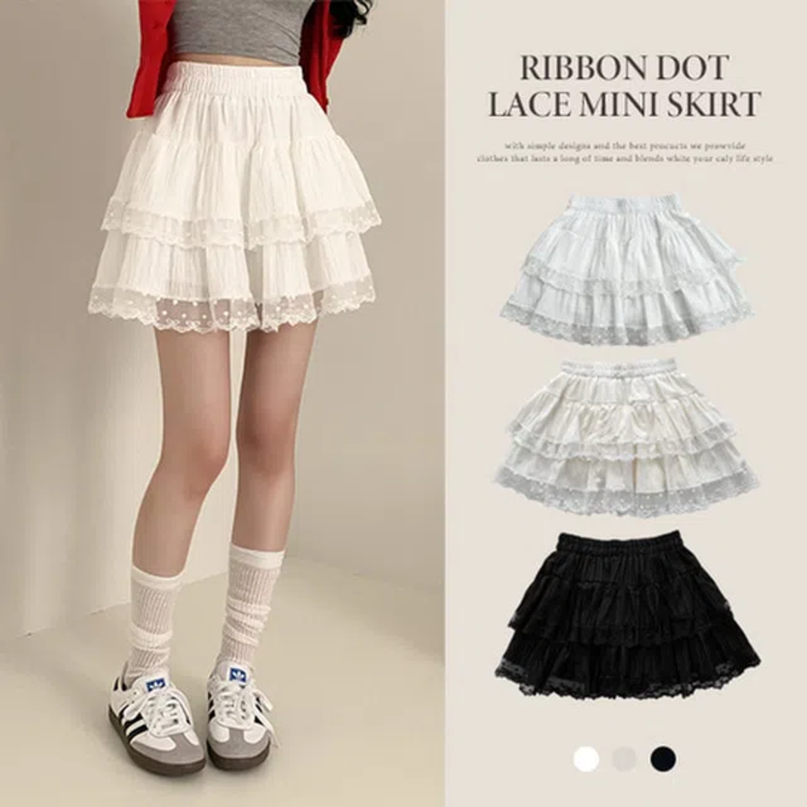 Мини-юбка с бантом, гороховым принтом и кружевными фестонами