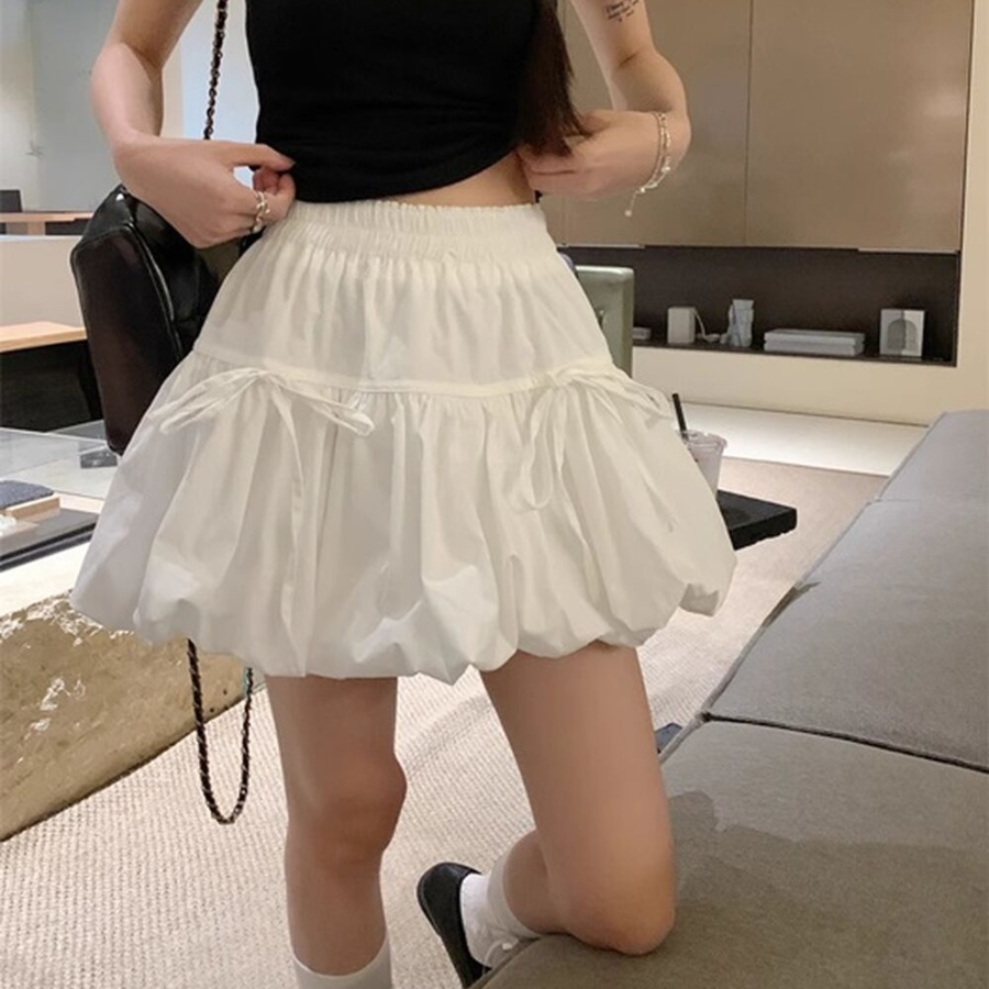 Мини-юбка-шорты с объёмным фасоном и бантом