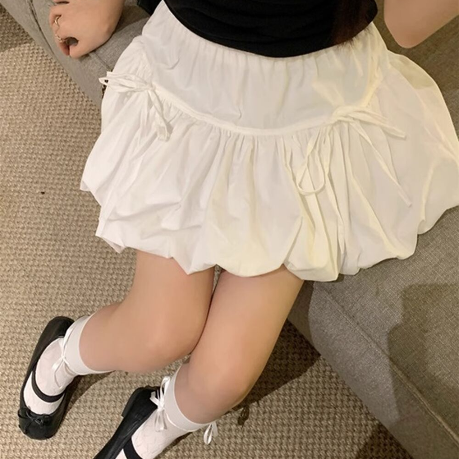 Мини-юбка-шорты с объёмным фасоном и бантом