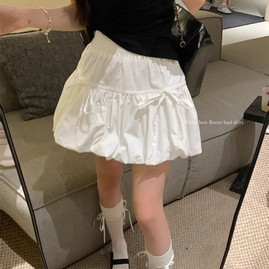 Мини-юбка-шорты с объёмным фасоном и бантом