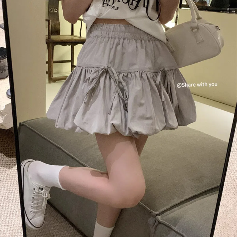 Мини-юбка-шорты с объёмным фасоном и бантом