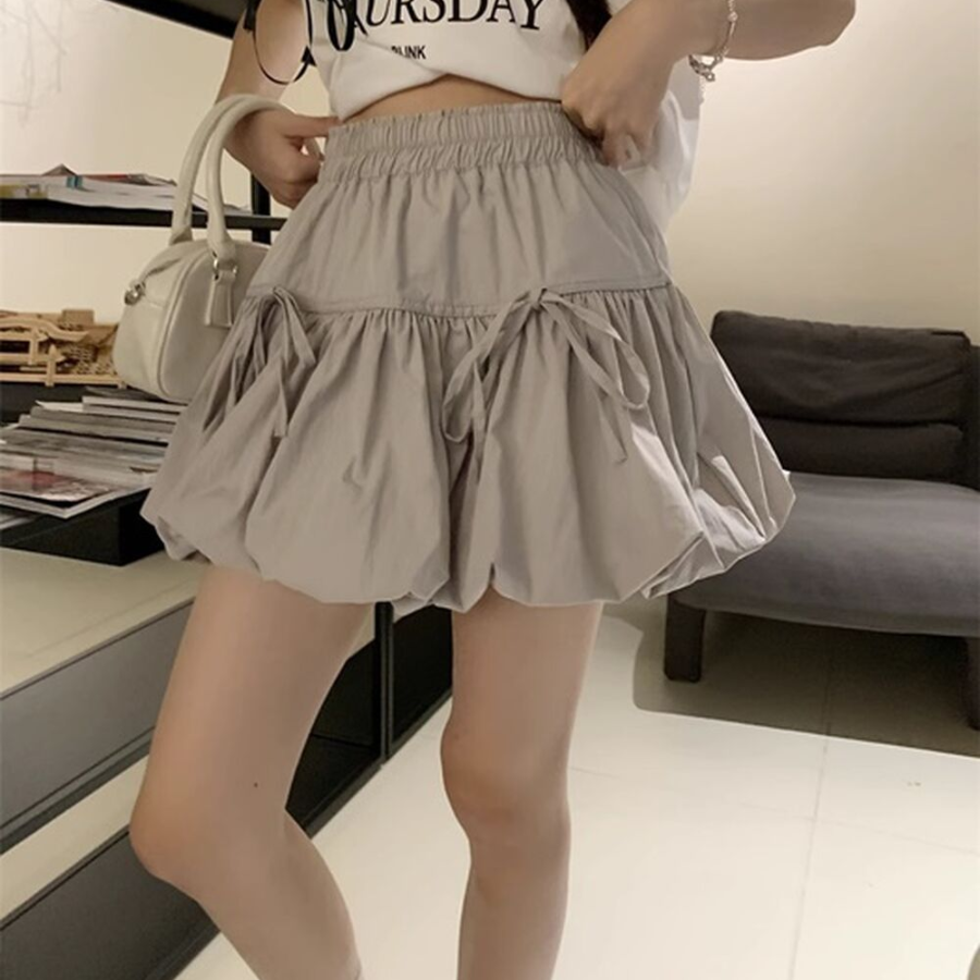 Мини-юбка-шорты с объёмным фасоном и бантом