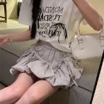 Мини-юбка-шорты с объёмным фасоном и бантом