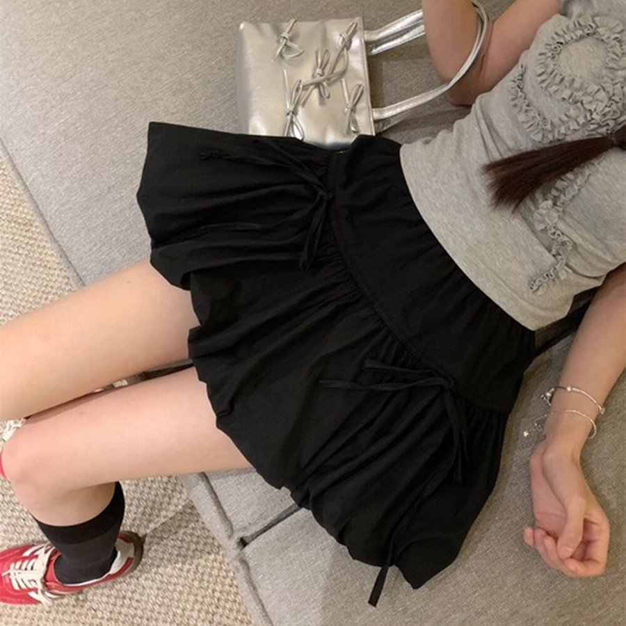 Мини-юбка-шорты с объёмным фасоном и бантом