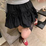 Мини-юбка-шорты с объёмным фасоном и бантом