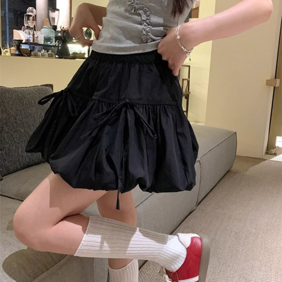 Мини-юбка-шорты с объёмным фасоном и бантом