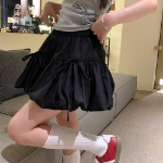 Мини-юбка-шорты с объёмным фасоном и бантом