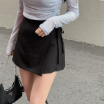 Мини-юбка с запахом и бантом