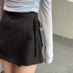 Мини-юбка с запахом и бантом