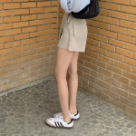 Мини-юбка с запахом и бантом