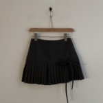 Мини-юбка с высокой посадкой, складками и бантом