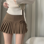 Мини-юбка с высокой посадкой, складками и бантом