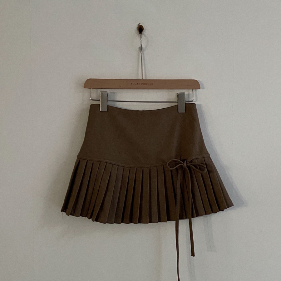 Мини-юбка с высокой посадкой, складками и бантом