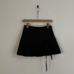 Мини-юбка с высокой посадкой, складками и бантом