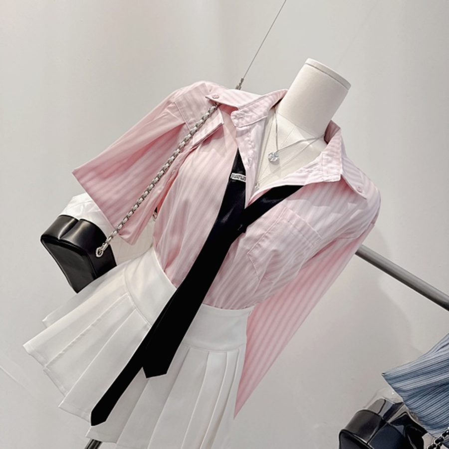 Мини-юбка с защипами и вшитыми шортами