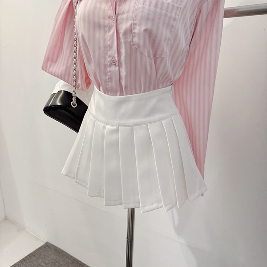 Мини-юбка с защипами и вшитыми шортами