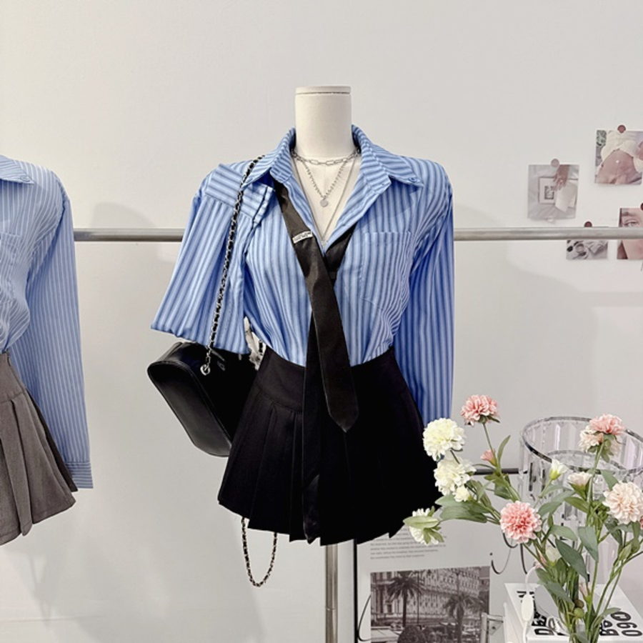 Мини-юбка с защипами и вшитыми шортами