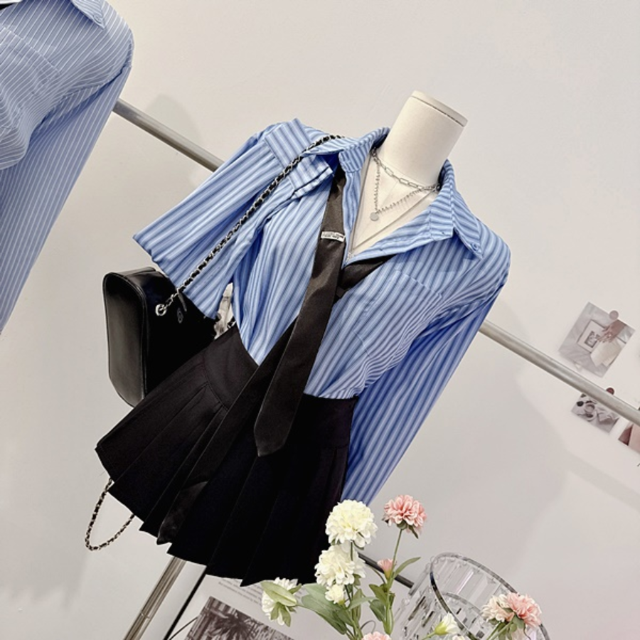 Мини-юбка с защипами и вшитыми шортами