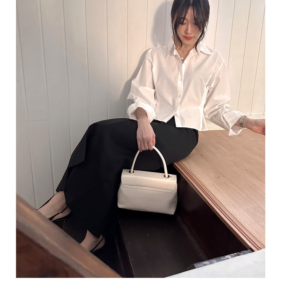 Асимметричная длинная юбка с высокой талией, защипами и разрезом